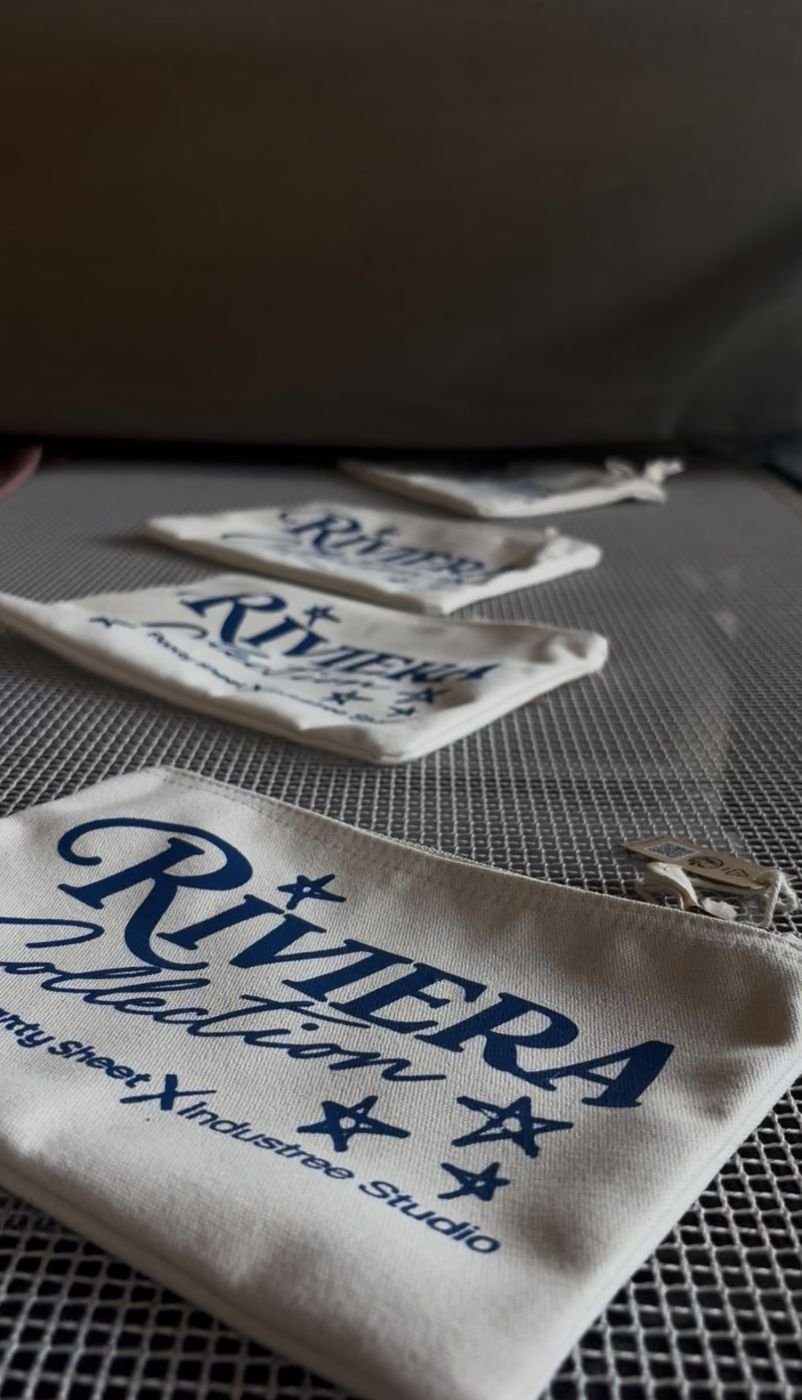 Pochette in cotone con logo blu